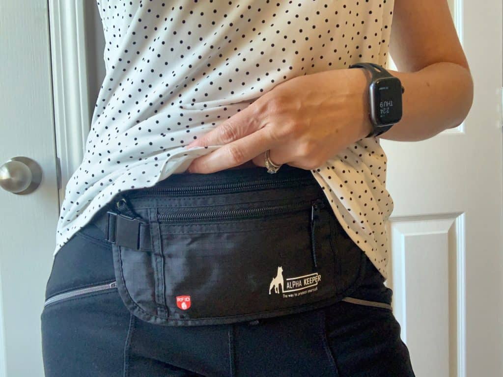 A woman showing a travel belt 