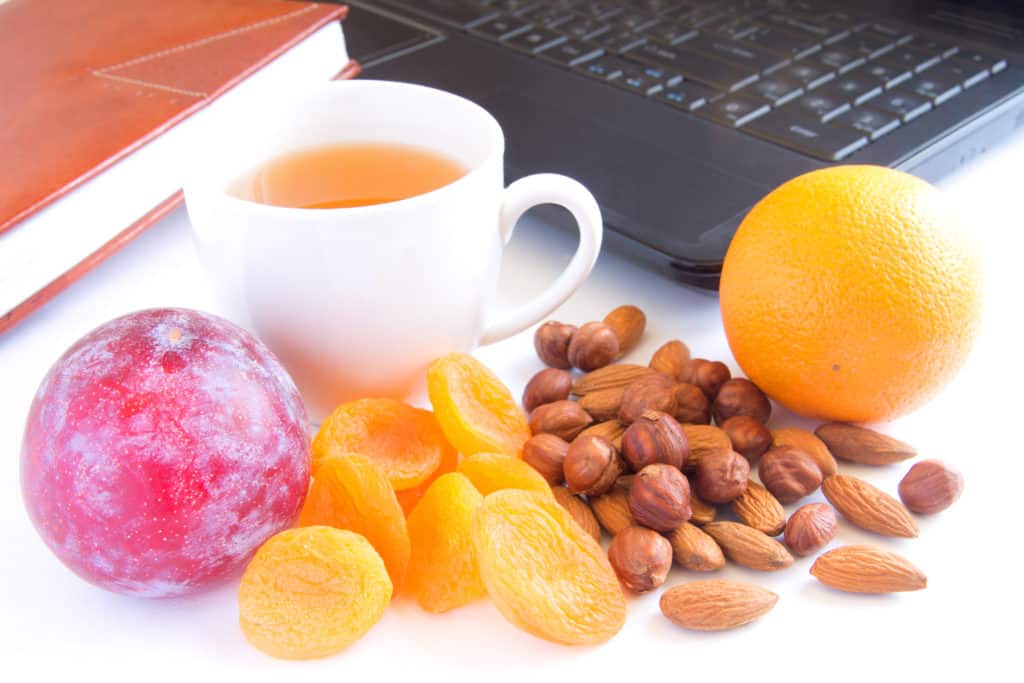 Health snack ideas for work of seeds, fresh and dry fruits.