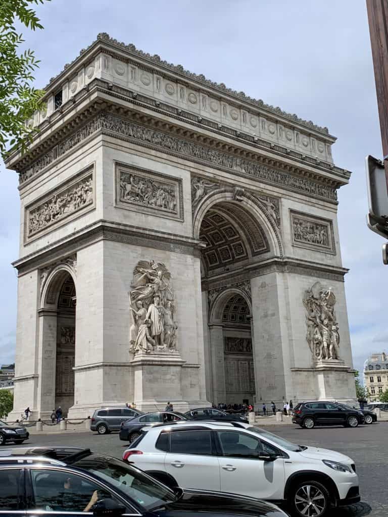 Arc de Triomphe in Paris with cars around it