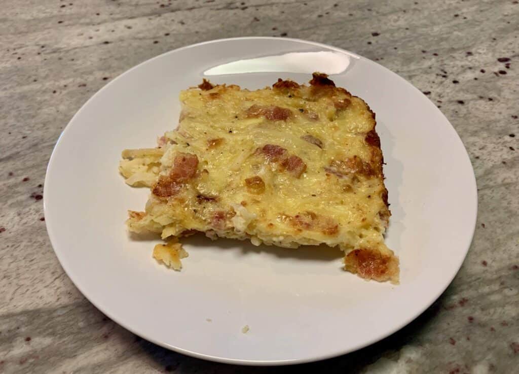 Christmas breakfast menu with a piece of egg and hash-brown casserole