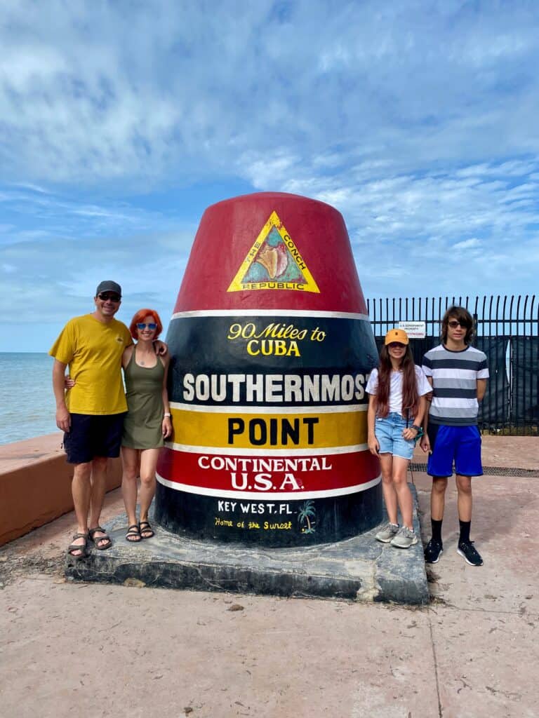 A family at the most southern continental US point in Florida