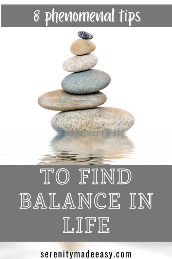Balancing rocks with a title that states 8 phenomenal tips to find balance in life