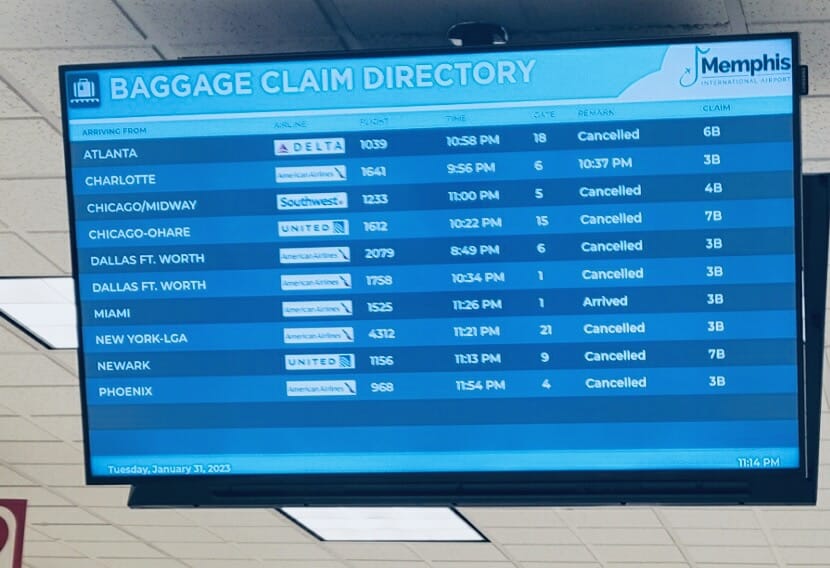 An airport tv screen showing many canceled flights causing air travel disruptions