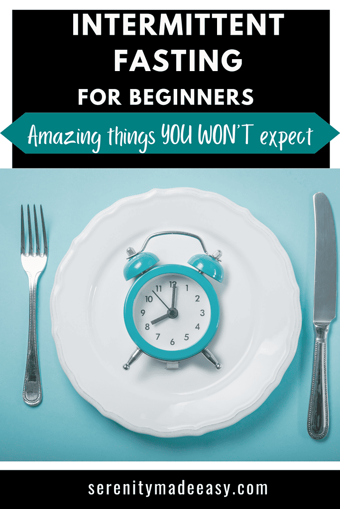 A white plate with only a teal clock on it and silverware next to it illustrating Intermittent fasting