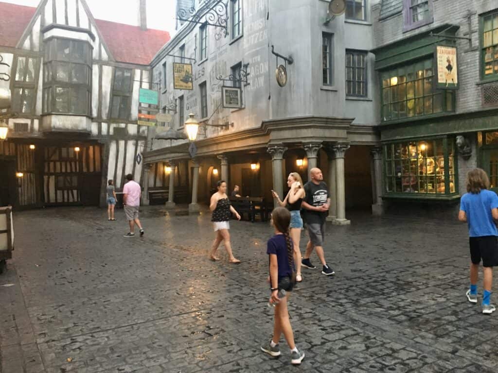 A girl casting spells in Diagon Alley.