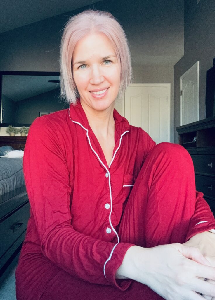 Woman in a red and white pajama set